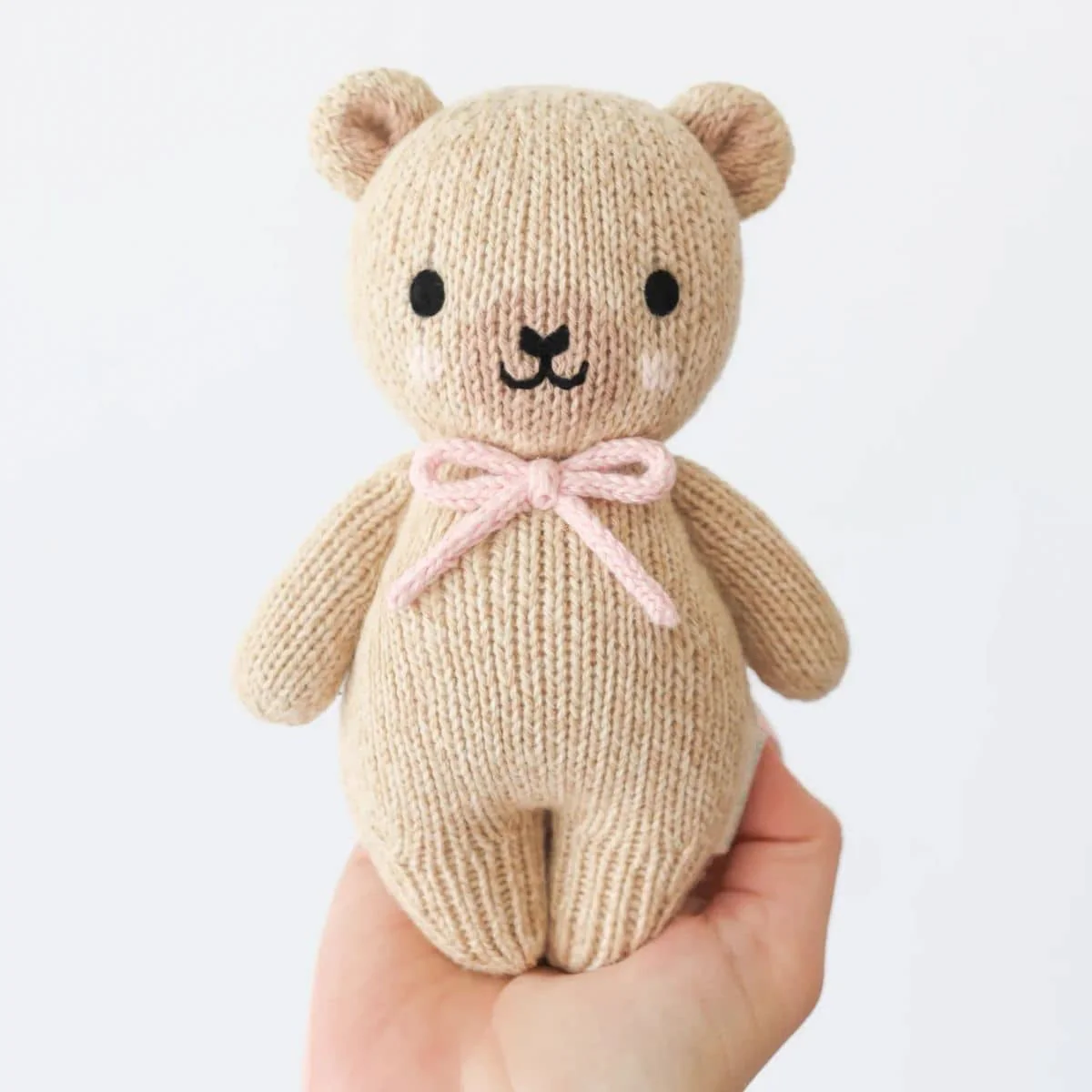 Cuddle + Kind Hand-Knit Doll - Baby Honey Bear (blush bow) - Image 3