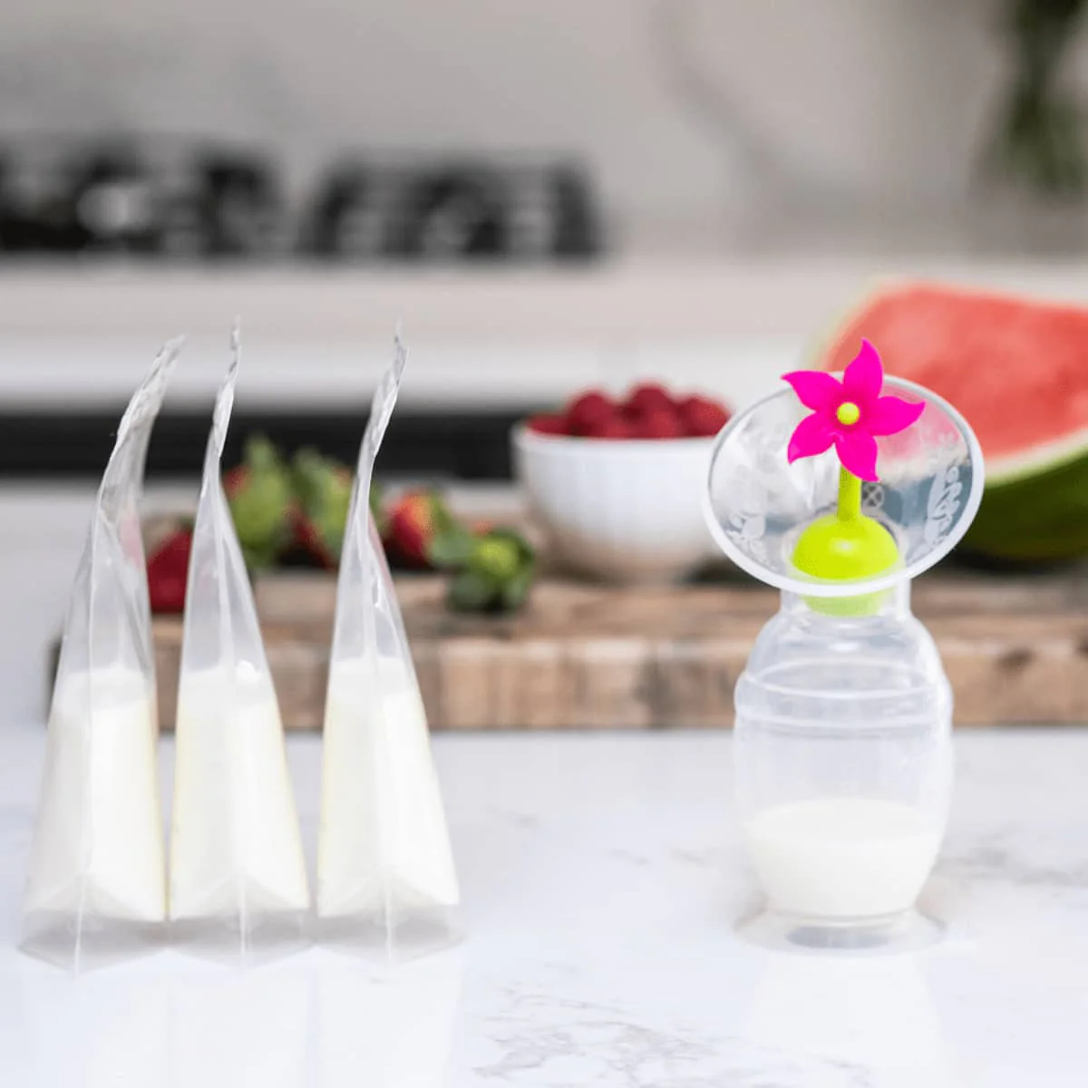 Haakaa Silicone Breast Pump with Suction Base and Flower Stopper - Image 3