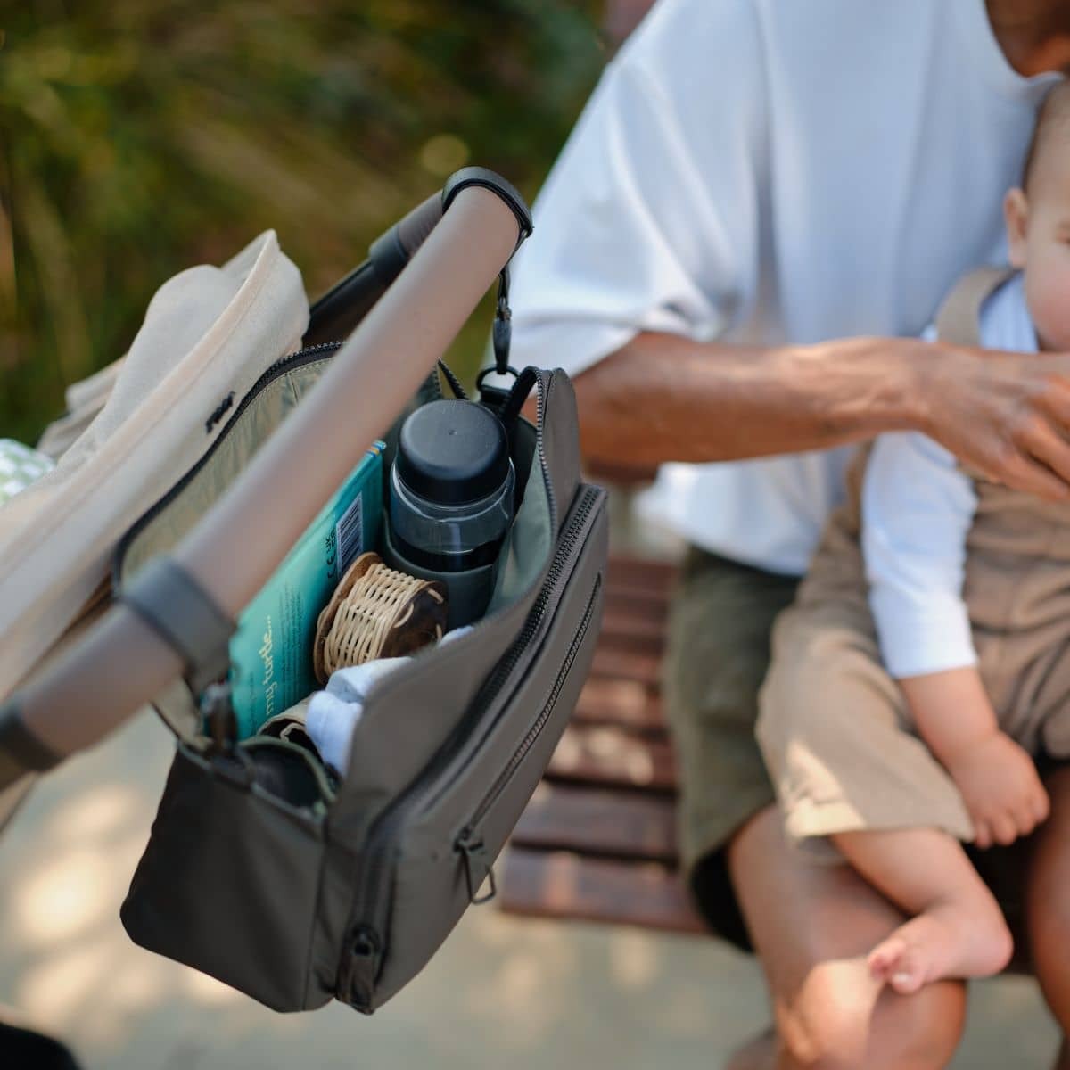 OiOi Multitasker Pram Caddy - Black Weatherproof - Image 4